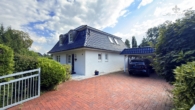einfahrt - Repräsentatives Viebrockhaus mit Mansarddach, Doppelcarport & Wohlfühl-Garten in Seevetal-Horst