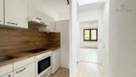 1. zi. whg. küche flur - Mehrfamilienhaus im Hittfelder Ortskern