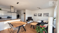 wohnraum - Über den Dächern von Stelle – moderne 3-Zimmer-Wohnung mit Weitblick bis Hamburg