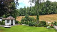 bild - Weite, Ruhe & Design: Moderner Winkelbungalow in Rosengarten mit Kamin, Gartenidylle & Hamburg-Nähe