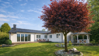 gartenblick - Weite, Ruhe & Design: Moderner Winkelbungalow in Rosengarten mit Kamin, Gartenidylle & Hamburg-Nähe