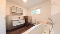 vollbad 1 - Weite, Ruhe & Design: Moderner Winkelbungalow in Rosengarten mit Kamin, Gartenidylle & Hamburg-Nähe