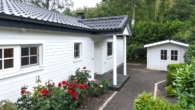 hauseingang (1) - Weite, Ruhe & Design: Moderner Winkelbungalow in Rosengarten mit Kamin, Gartenidylle & Hamburg-Nähe