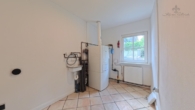 hwr - Weite, Ruhe & Design: Moderner Winkelbungalow in Rosengarten mit Kamin, Gartenidylle & Hamburg-Nähe